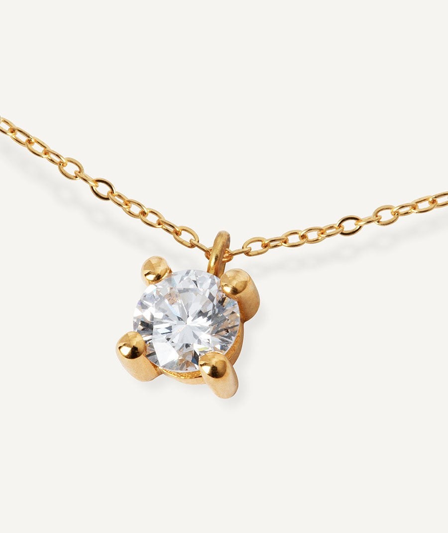 Gold necklace with a solitary diamond