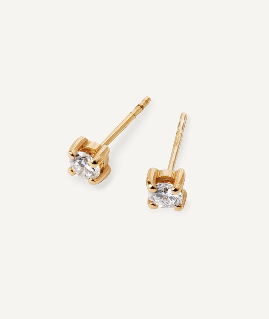 Diamond and gold solitaire earrings