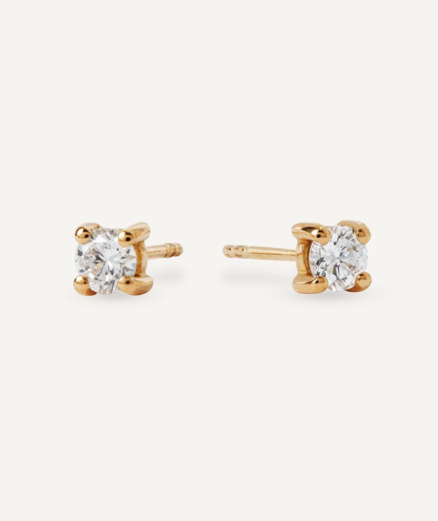 Diamond and gold solitaire earrings