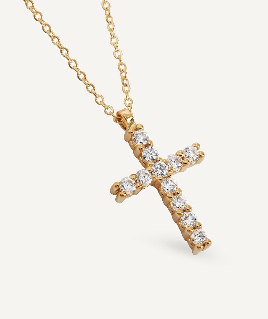 Diamond and gold cross necklace