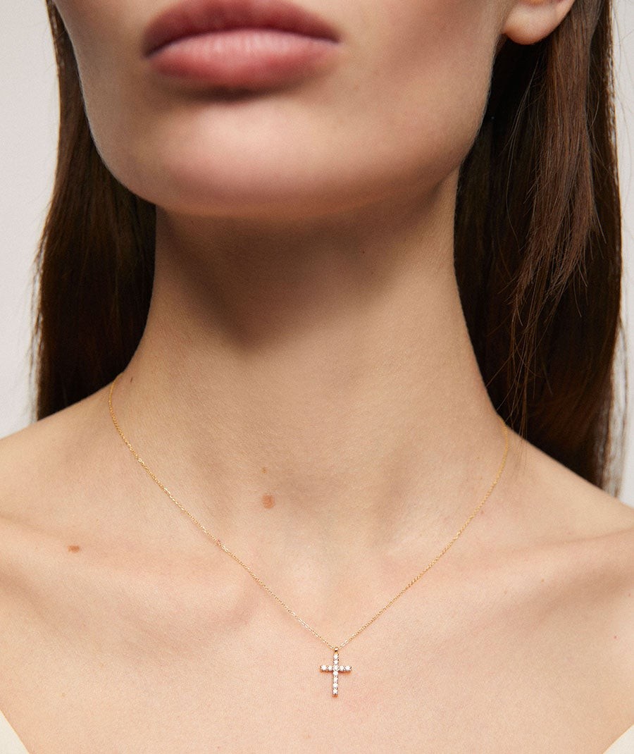 Diamond and gold cross necklace